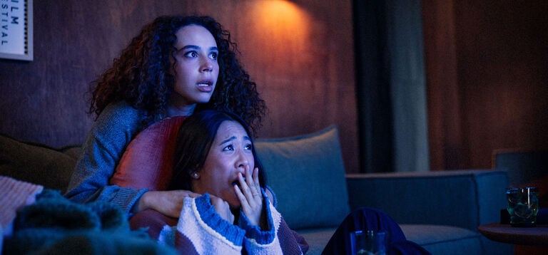 Women watching TV Women watching TV