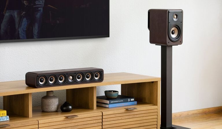 Soundbar sitting on a dresser.