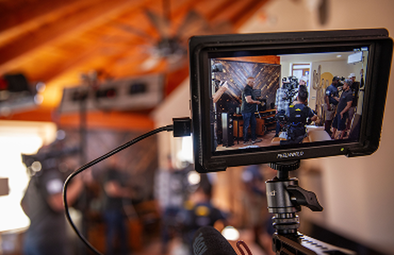 A tv crew as seen through a viewfinder