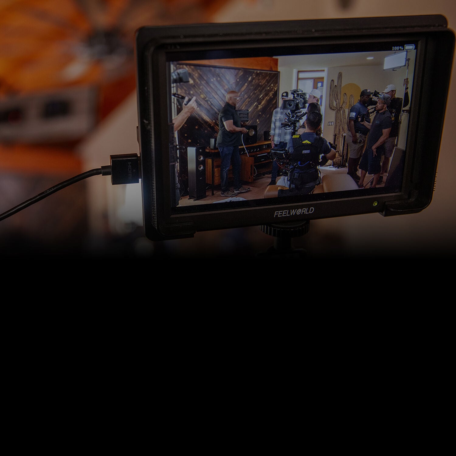 a tv crew seen through a camera